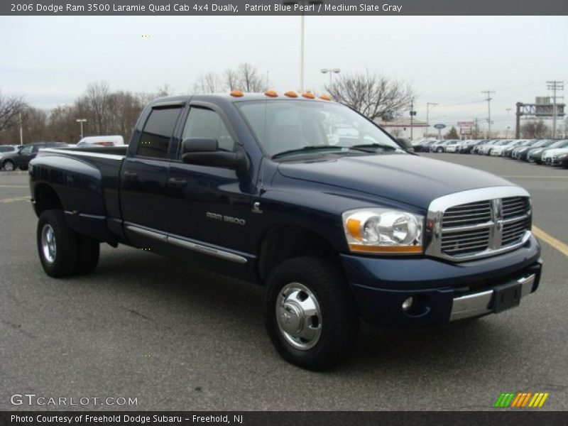 Front 3/4 View of 2006 Ram 3500 Laramie Quad Cab 4x4 Dually