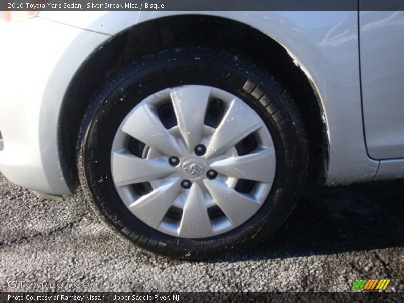 Silver Streak Mica / Bisque 2010 Toyota Yaris Sedan