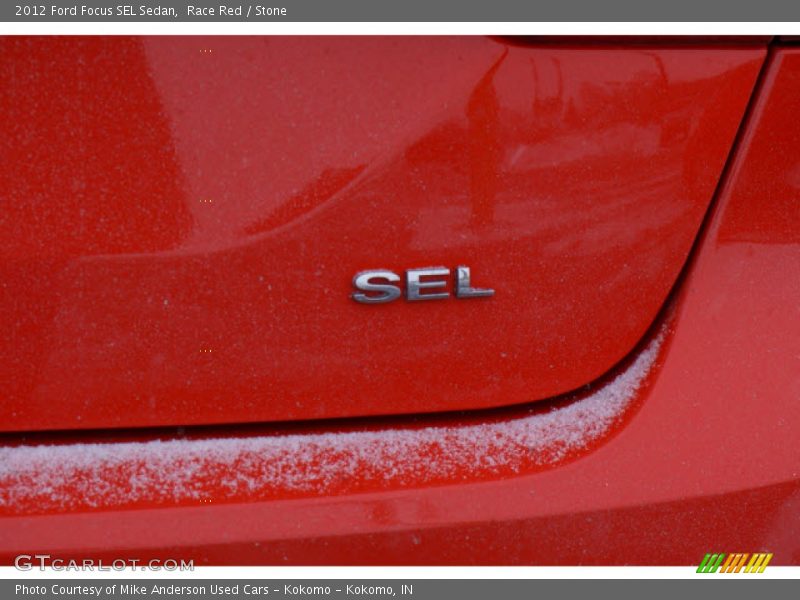 Race Red / Stone 2012 Ford Focus SEL Sedan