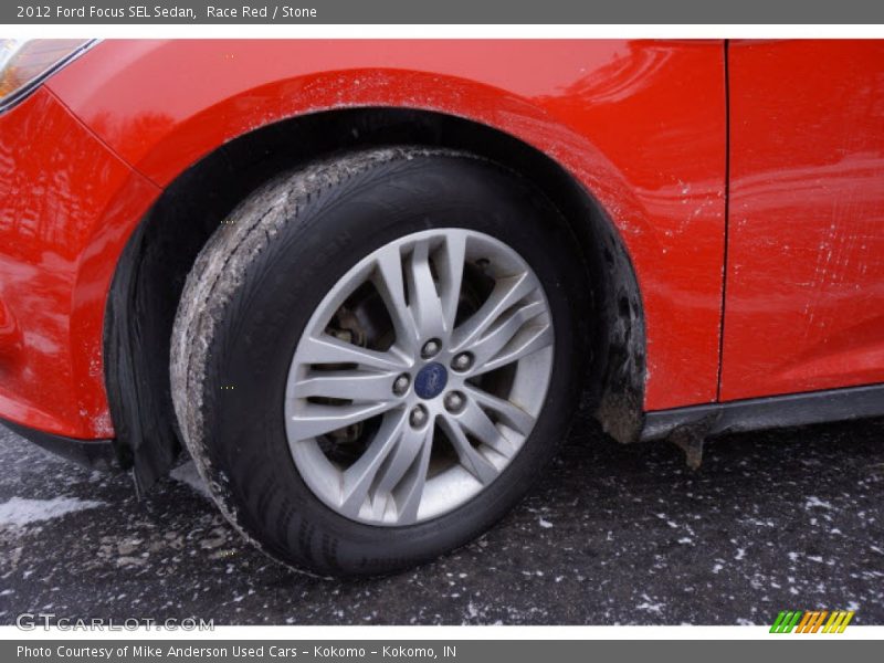 Race Red / Stone 2012 Ford Focus SEL Sedan