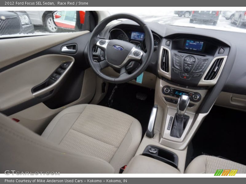Race Red / Stone 2012 Ford Focus SEL Sedan