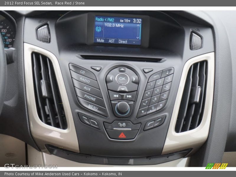 Race Red / Stone 2012 Ford Focus SEL Sedan