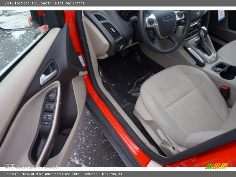 Race Red / Stone 2012 Ford Focus SEL Sedan