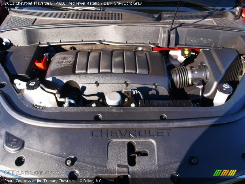 Red Jewel Metallic / Dark Gray/Light Gray 2011 Chevrolet Traverse LT AWD
