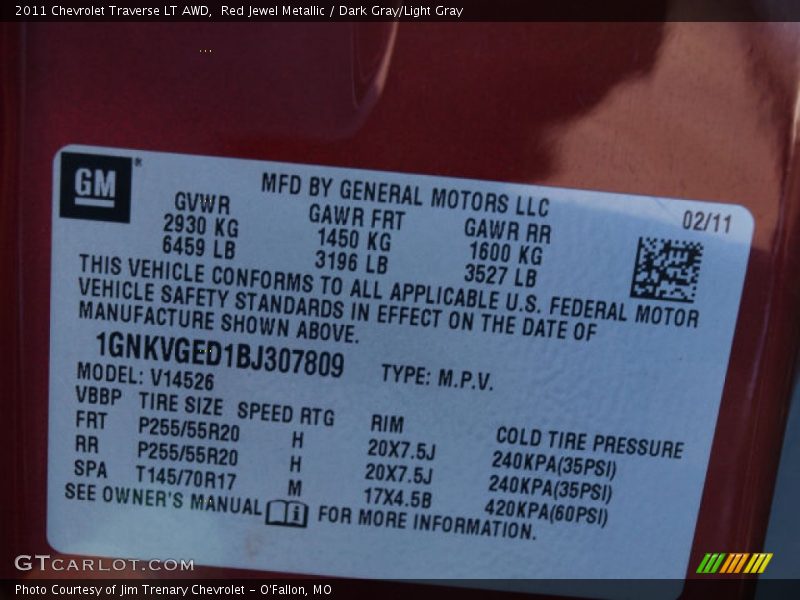 Red Jewel Metallic / Dark Gray/Light Gray 2011 Chevrolet Traverse LT AWD