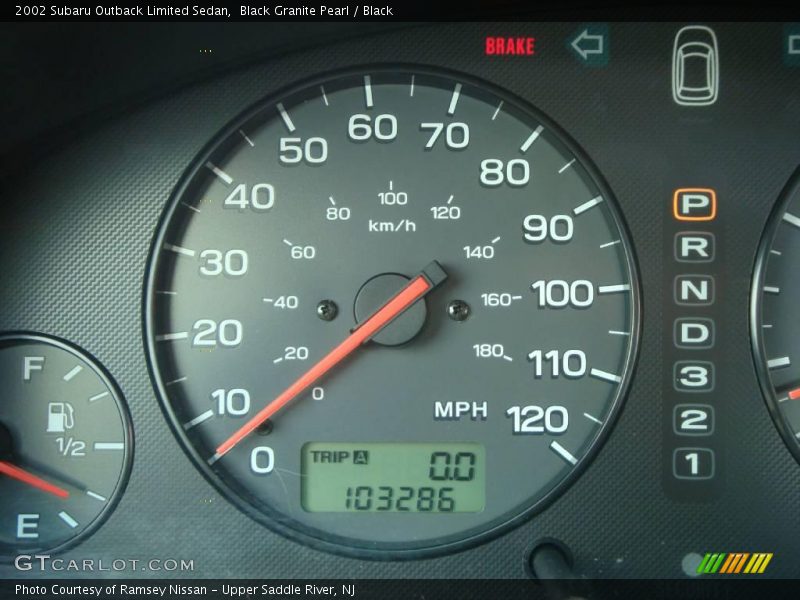 Black Granite Pearl / Black 2002 Subaru Outback Limited Sedan