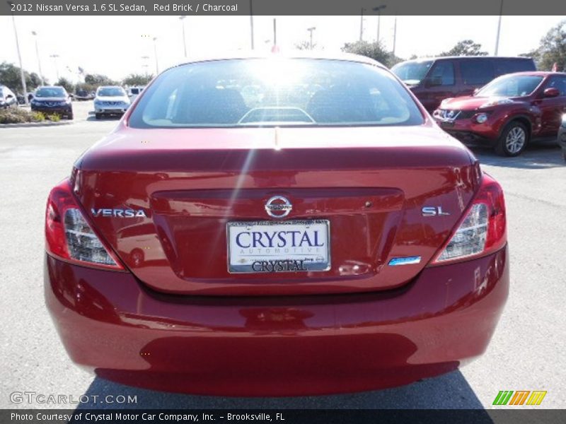Red Brick / Charcoal 2012 Nissan Versa 1.6 SL Sedan