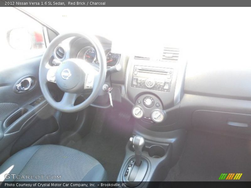 Red Brick / Charcoal 2012 Nissan Versa 1.6 SL Sedan