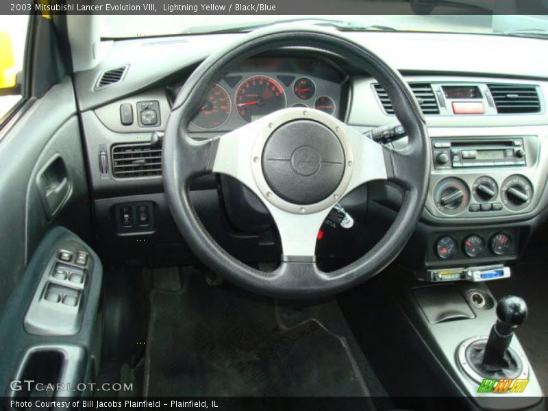 Lightning Yellow / Black/Blue 2003 Mitsubishi Lancer Evolution VIII