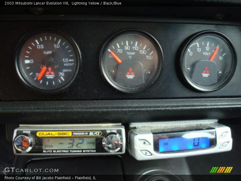 Lightning Yellow / Black/Blue 2003 Mitsubishi Lancer Evolution VIII