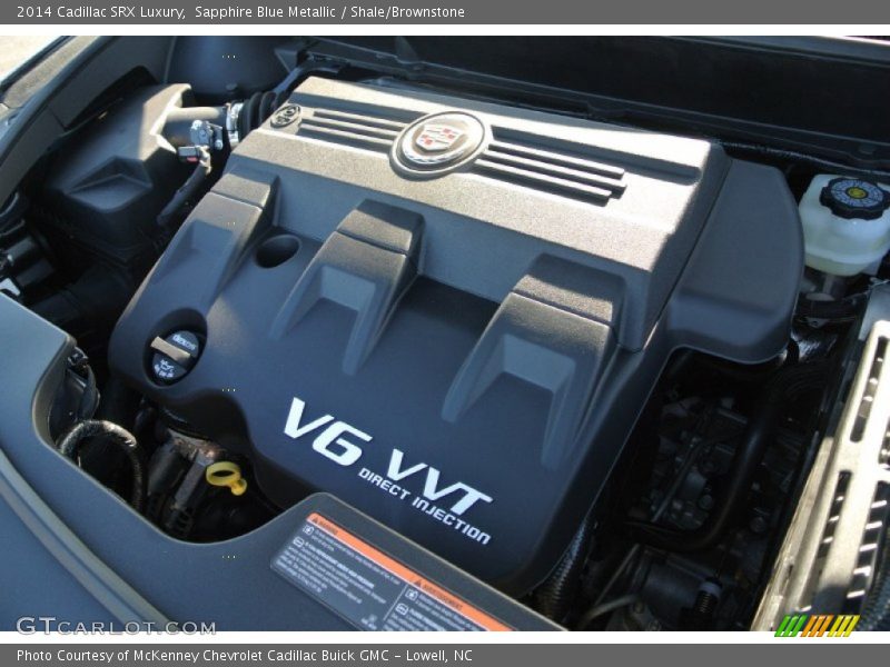 Sapphire Blue Metallic / Shale/Brownstone 2014 Cadillac SRX Luxury