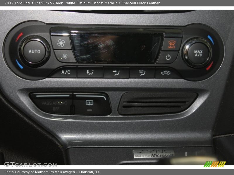 White Platinum Tricoat Metallic / Charcoal Black Leather 2012 Ford Focus Titanium 5-Door