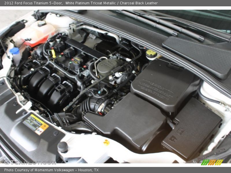 White Platinum Tricoat Metallic / Charcoal Black Leather 2012 Ford Focus Titanium 5-Door