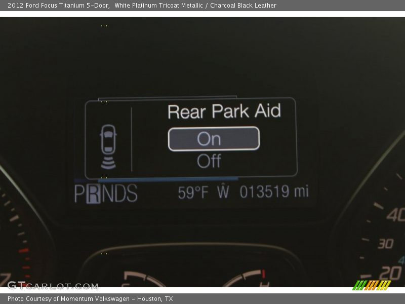 White Platinum Tricoat Metallic / Charcoal Black Leather 2012 Ford Focus Titanium 5-Door