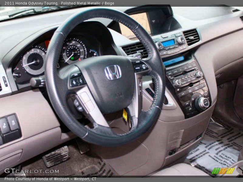 Polished Metal Metallic / Beige 2011 Honda Odyssey Touring