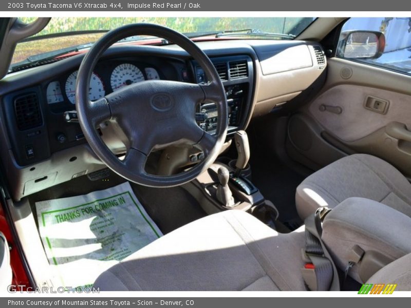 Impulse Red Pearl / Oak 2003 Toyota Tacoma V6 Xtracab 4x4