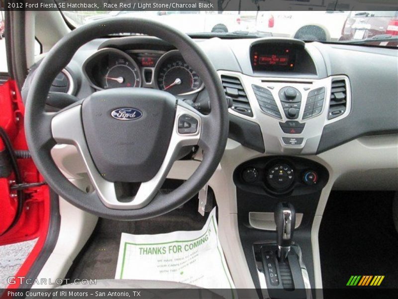 Race Red / Light Stone/Charcoal Black 2012 Ford Fiesta SE Hatchback