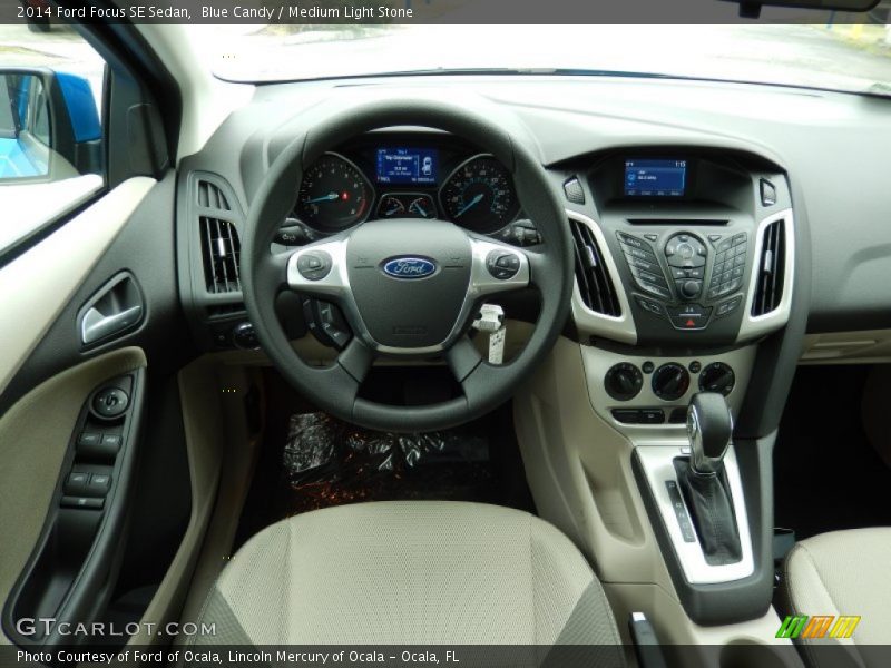 Blue Candy / Medium Light Stone 2014 Ford Focus SE Sedan