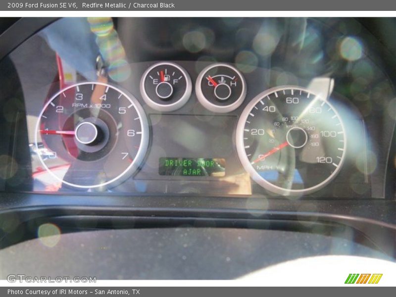 Redfire Metallic / Charcoal Black 2009 Ford Fusion SE V6