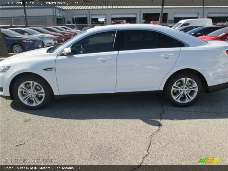 Oxford White / Dune 2014 Ford Taurus SEL