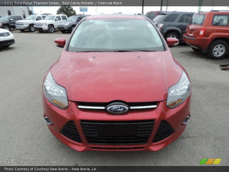 Red Candy Metallic / Charcoal Black 2012 Ford Focus Titanium Sedan