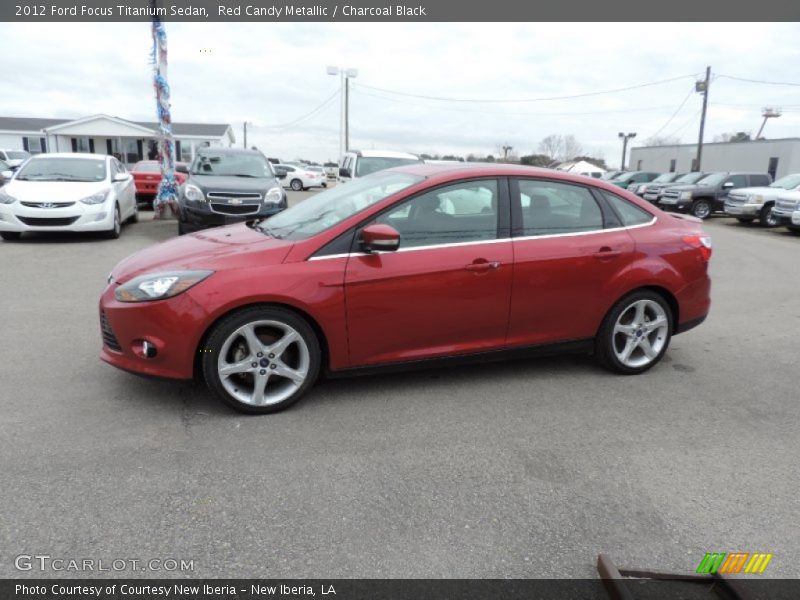 Red Candy Metallic / Charcoal Black 2012 Ford Focus Titanium Sedan