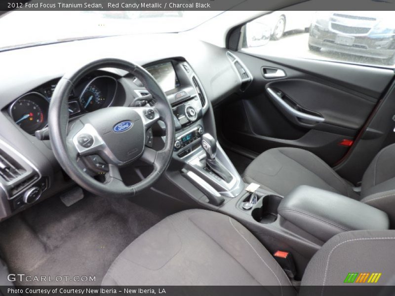 Red Candy Metallic / Charcoal Black 2012 Ford Focus Titanium Sedan