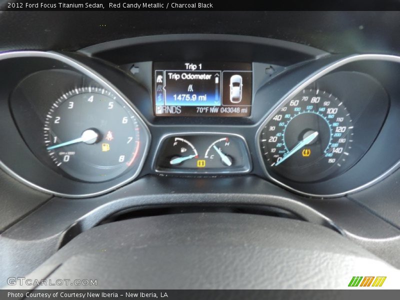 Red Candy Metallic / Charcoal Black 2012 Ford Focus Titanium Sedan