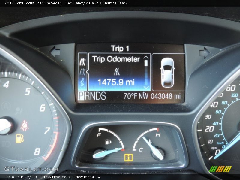 Red Candy Metallic / Charcoal Black 2012 Ford Focus Titanium Sedan