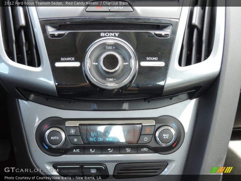 Red Candy Metallic / Charcoal Black 2012 Ford Focus Titanium Sedan