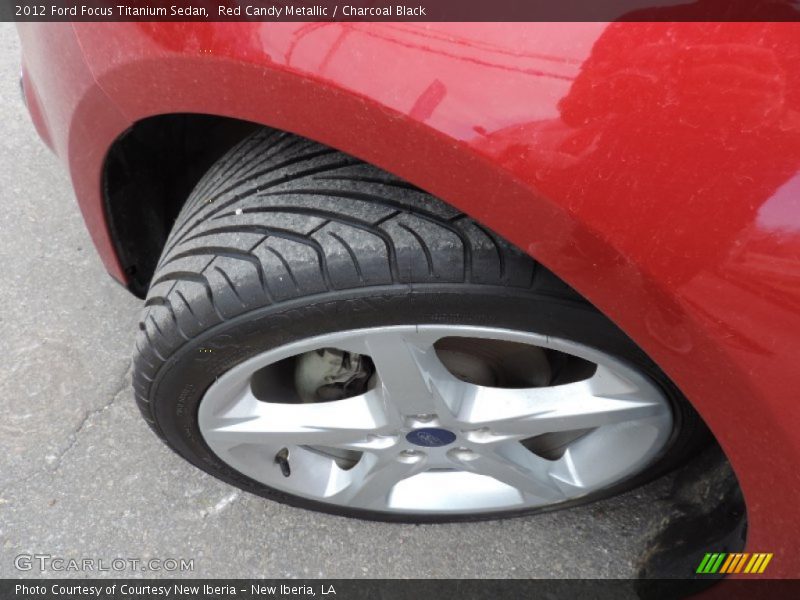 Red Candy Metallic / Charcoal Black 2012 Ford Focus Titanium Sedan