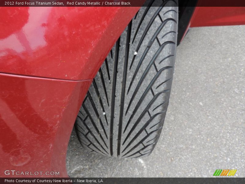Red Candy Metallic / Charcoal Black 2012 Ford Focus Titanium Sedan