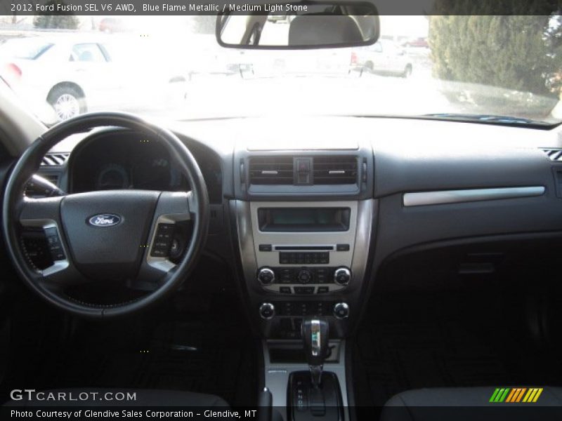 Blue Flame Metallic / Medium Light Stone 2012 Ford Fusion SEL V6 AWD