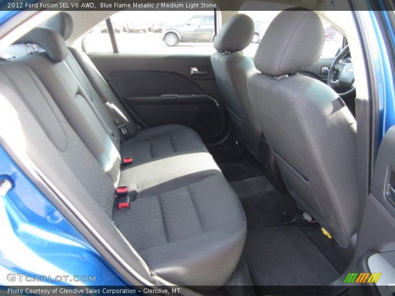 Blue Flame Metallic / Medium Light Stone 2012 Ford Fusion SEL V6 AWD