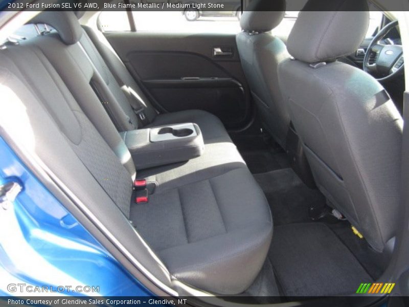 Blue Flame Metallic / Medium Light Stone 2012 Ford Fusion SEL V6 AWD