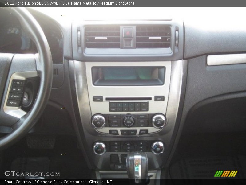 Blue Flame Metallic / Medium Light Stone 2012 Ford Fusion SEL V6 AWD