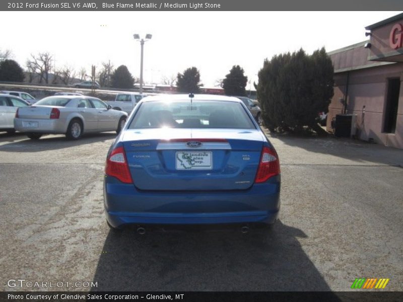 Blue Flame Metallic / Medium Light Stone 2012 Ford Fusion SEL V6 AWD