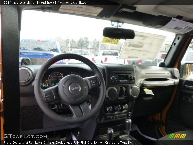 Amp'd / Black 2014 Jeep Wrangler Unlimited Sport S 4x4