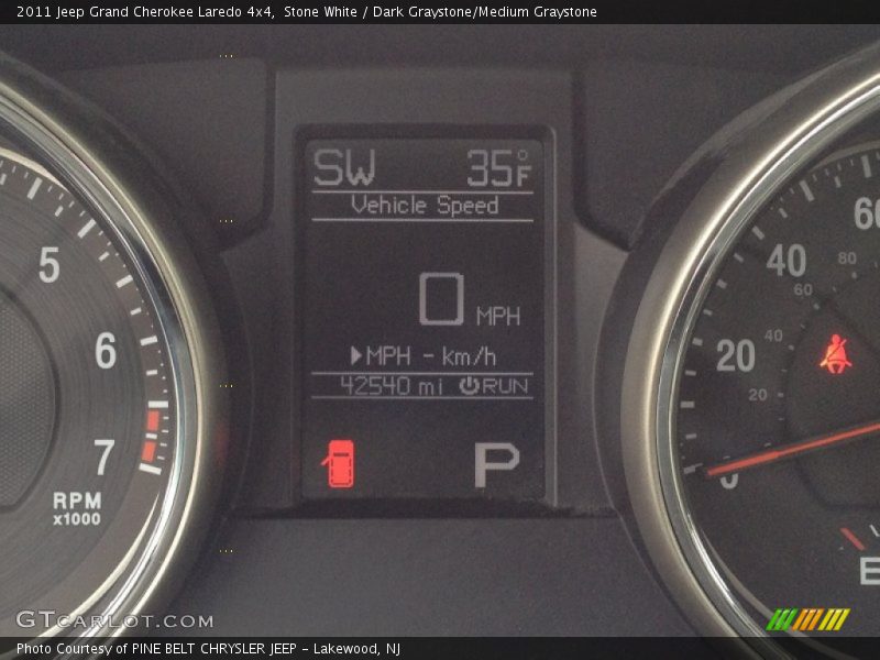 Stone White / Dark Graystone/Medium Graystone 2011 Jeep Grand Cherokee Laredo 4x4