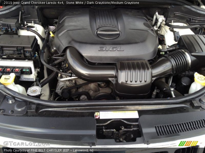 Stone White / Dark Graystone/Medium Graystone 2011 Jeep Grand Cherokee Laredo 4x4