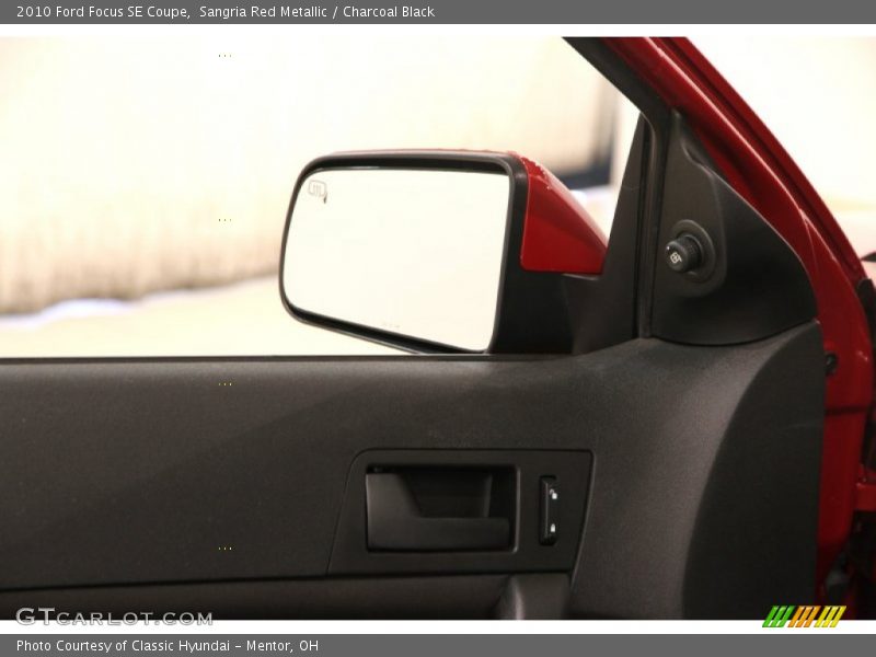 Sangria Red Metallic / Charcoal Black 2010 Ford Focus SE Coupe