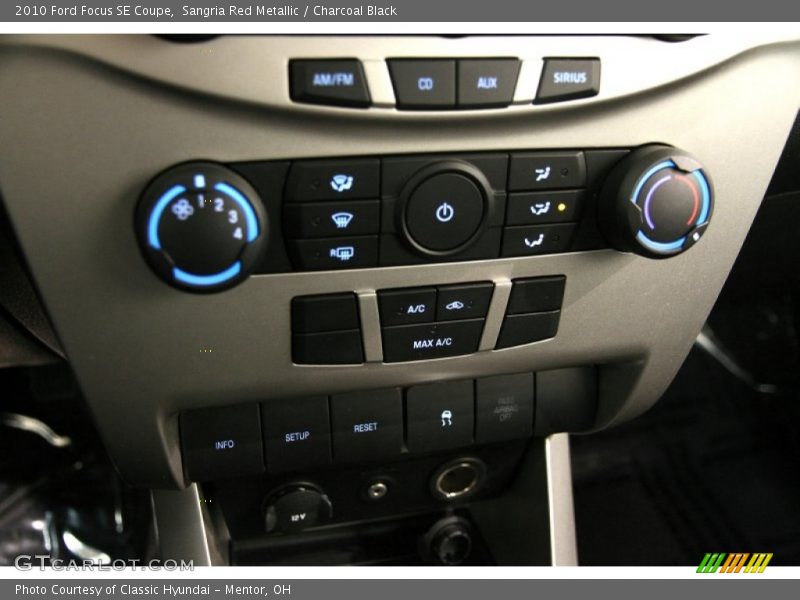 Sangria Red Metallic / Charcoal Black 2010 Ford Focus SE Coupe