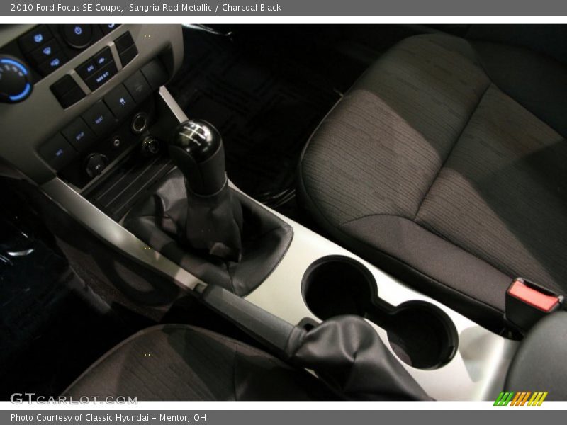 Sangria Red Metallic / Charcoal Black 2010 Ford Focus SE Coupe