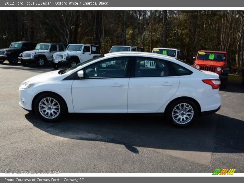 Oxford White / Charcoal Black 2012 Ford Focus SE Sedan