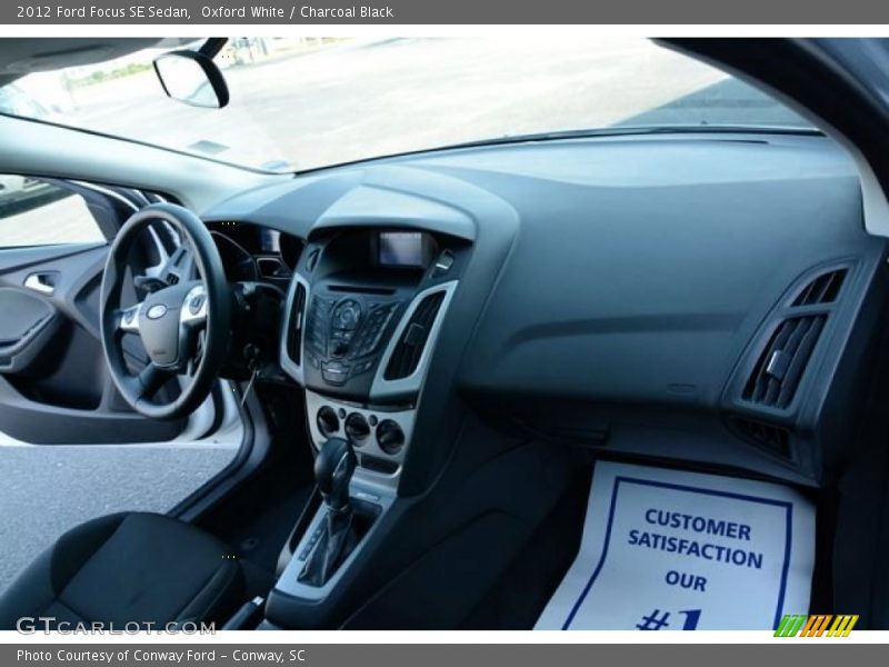 Oxford White / Charcoal Black 2012 Ford Focus SE Sedan