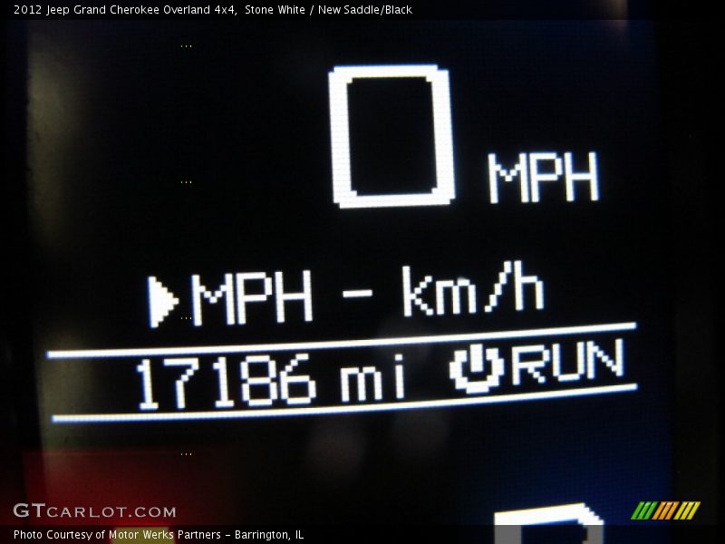 Stone White / New Saddle/Black 2012 Jeep Grand Cherokee Overland 4x4