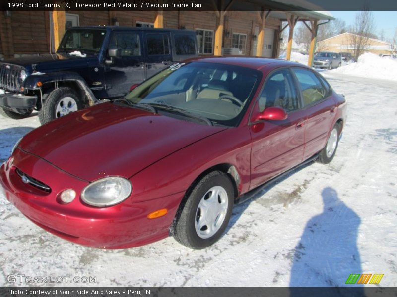Toreador Red Metallic / Medium Prairie Tan 1998 Ford Taurus LX