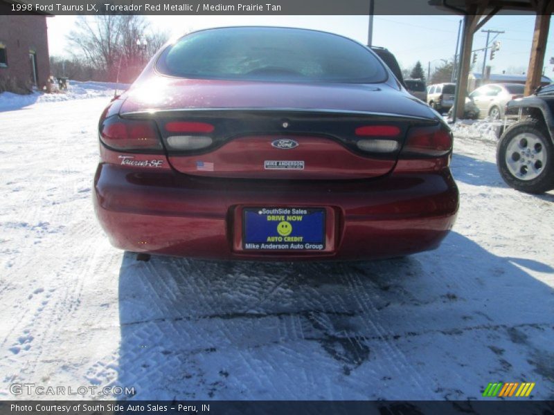 Toreador Red Metallic / Medium Prairie Tan 1998 Ford Taurus LX