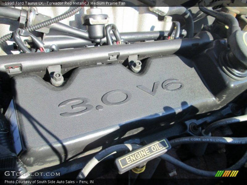 Toreador Red Metallic / Medium Prairie Tan 1998 Ford Taurus LX