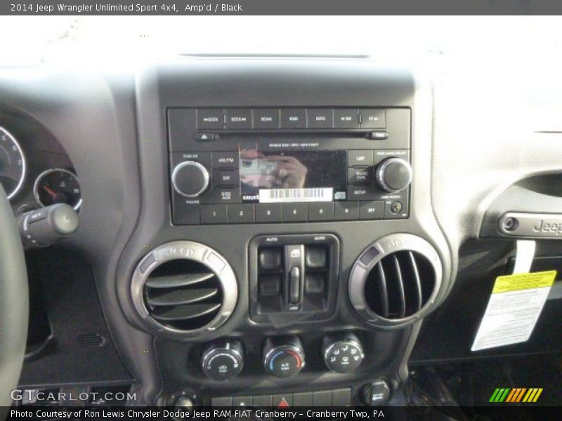 Amp'd / Black 2014 Jeep Wrangler Unlimited Sport 4x4